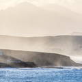 Faro de Comillas y neblina marina del oleaje